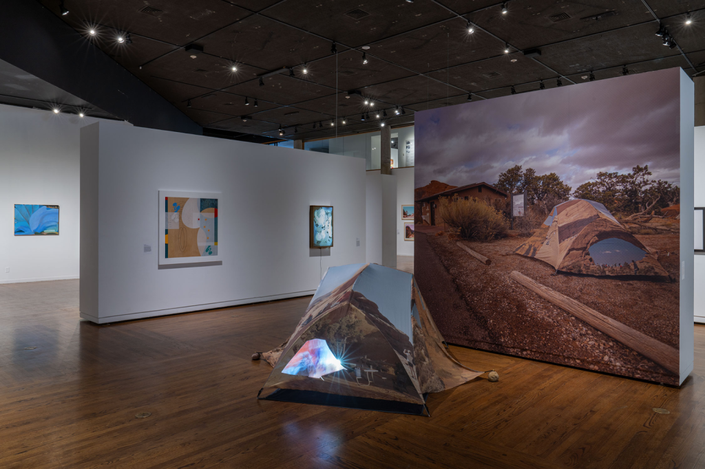 Arches National Park (Devil's Garden), Inkjet on silk, tent hardware, rocks, video projection, Dimensions variable (about 9’x9’ footprint including stakes, 10’ wall for decal), 2020 Pictured at UMOCA