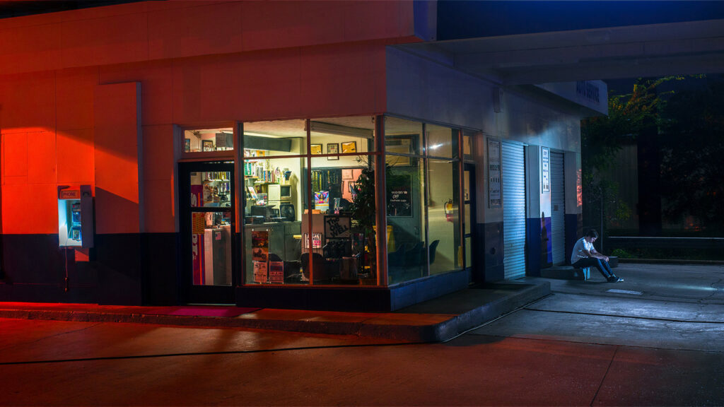 A dark photo of a business at night.