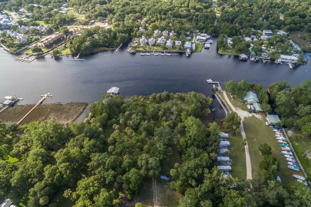 The Steinhatchee River with houses and docks along its banks. 