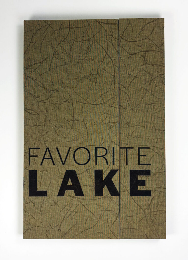 there is a sign that says favorite lake on the side of a wall
