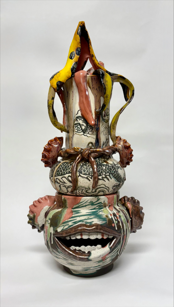 there is a ceramic sculpture of a man with a banana on his head