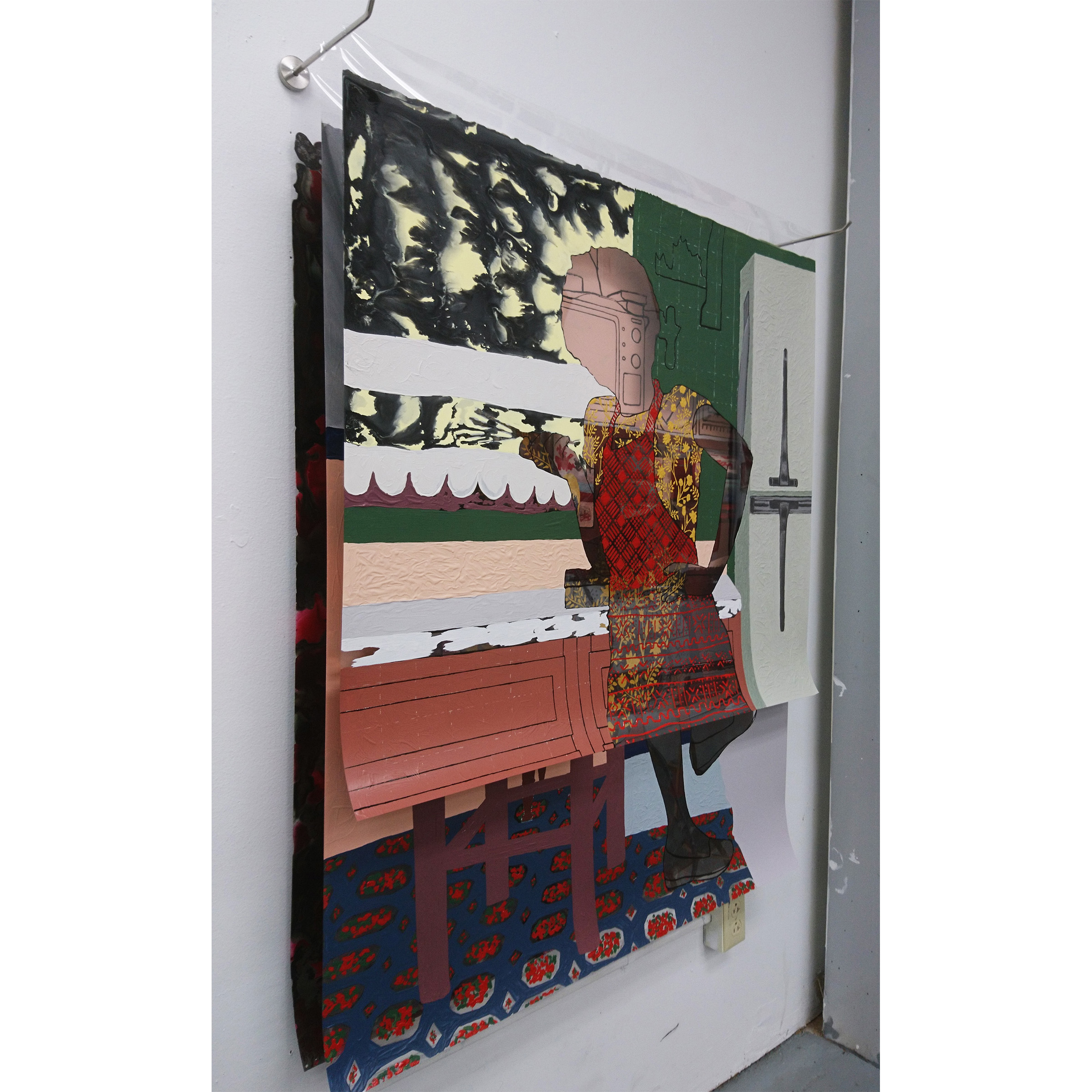 there is a picture of a painting on the wall of a building