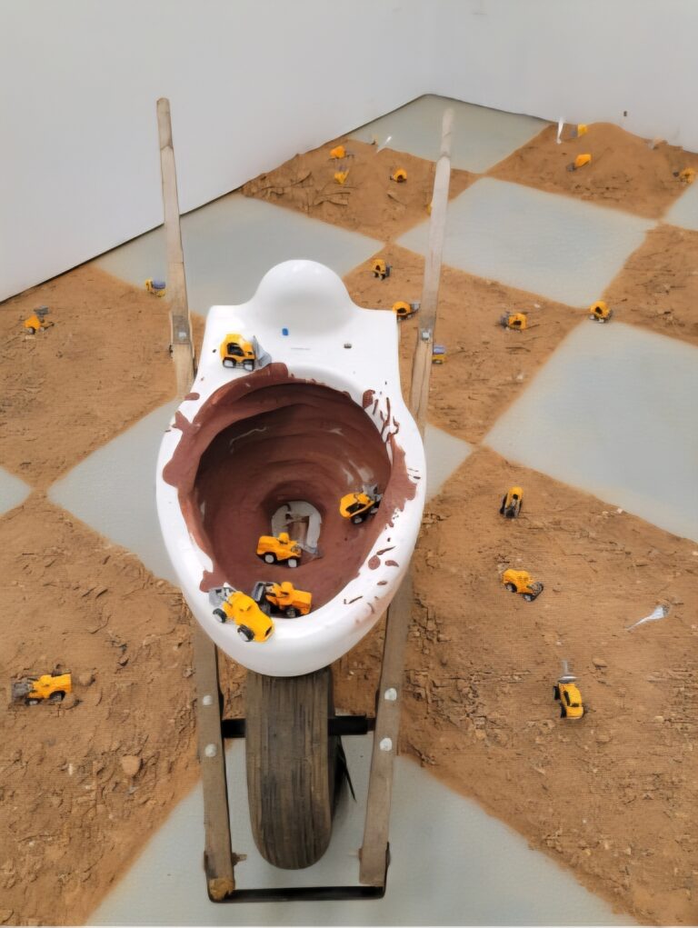 this is an image of a toilet with construction equipment on the floor